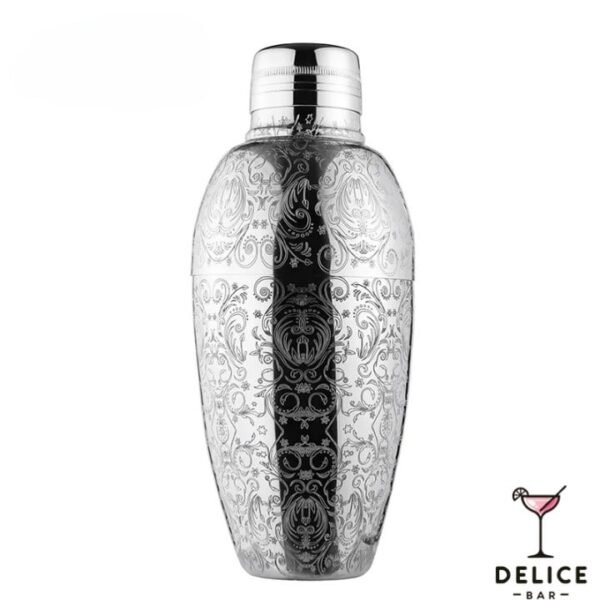 Shaker en acier inoxydable de couleur argent, vintage à motifs argentés. Shaker pour cocktails