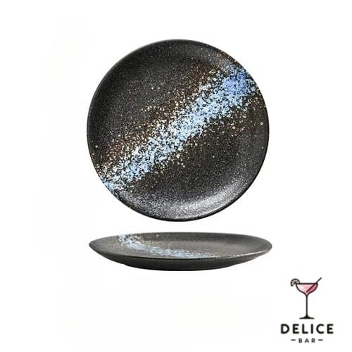 Assiettes noires motifs éclaboussures